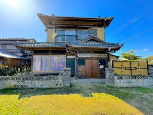 a house with a gate in front of it at ANGO KUJUKURI 3 - Vacation STAY 17094 in Kujukuri