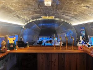 a bar in a room with a blue ceiling at CAMP & BEER BEERBELLY ISESHIMA - Vacation STAY 82905v in Shima