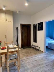 Ένα ή περισσότερα κρεβάτια σε δωμάτιο στο Loftson Apartament