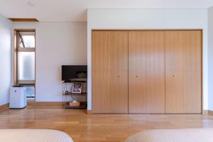 Μια τηλεόραση ή/και κέντρο ψυχαγωγίας στο AOI Sauna SPA & Dog Villa HAKODATE - Vacation STAY 16937