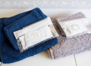 two blue towels sitting on top of a floor at Mihamakan, Izu Oshima - Vacation STAY 89849v in Oshima +74 photos