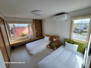 Ένα ή περισσότερα κρεβάτια σε δωμάτιο στο Onumakouen kenzo no Shikiya - Vacation STAY 98612v