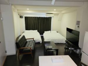 Giường trong phòng chung tại Earlville - Vacation STAY 16987