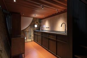 Køkken eller tekøkken på CORRUGATED HOUSE - Vacation STAY 17005