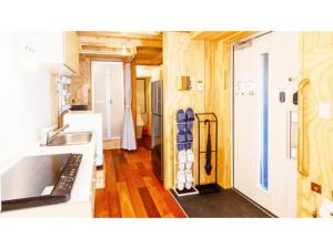 a kitchen with a sink and a counter top at Mobilita Court Iwate - Vacation STAY 13604v in Hachimantai