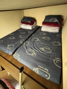 two beds sitting on top of a shelf at Real Corp 102 - Vacation STAY 10915v in Chiba