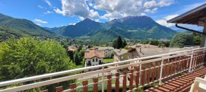 a view from a balcony with mountains in the background at Cassina Bellavista. Vacanza perfetta in Cremeno