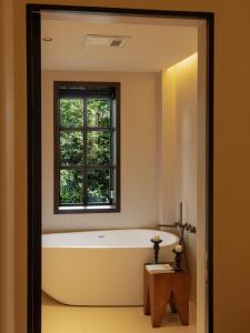 Afbeelding uit fotogalerij van Zhi'an Hotel-大理枝安酒店 in Dali (oude stad)