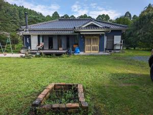 a house with a garden in front of it at Villa Mountainman - Vacation STAY 23091v in Ichijuku