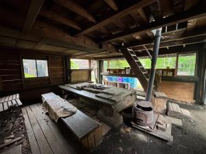 an inside view of a room with a table and windows at Playhouse Conifer - Vacation STAY 24024v in Mikage
