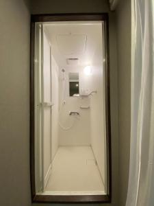 a mirror in a bathroom with a shower at Nagasaki Sakayado OKU - Vacation STAY 35113v in Nagasaki