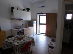 Η κουζίνα ή μικρή κουζίνα στο Ionica 17