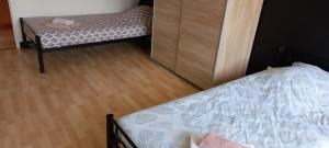 Postel nebo postele na pokoji v ubytování maison havre de paix en haute Saintonge