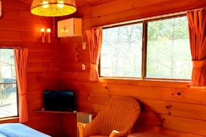 Camera con letto, TV e finestre di - Acorn Garden - - Vacation STAY 54262v a To-katta