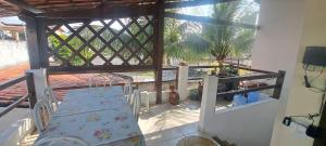 a view of a balcony with a staircase in a room at Appartamento em ponta negra in Natal