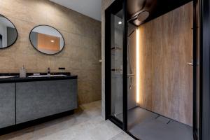 a bathroom with a sink and a mirror at Oyado michi - Vacation STAY 47702v in Sasebo +15 photos