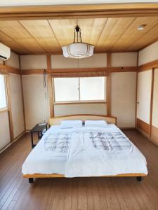 Giường trong phòng chung tại AO1 Aomori - Vacation STAY 53541v