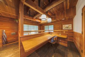 a wooden ping pong table in a room with wooden walls at Zao Villa Suite Zen-ZEN - Vacation STAY 74899v in To-katta +35 photos