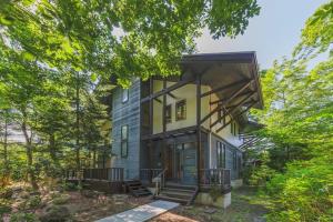 a house with a balcony on the side of it at Zao Villa Suite Zen-ZEN - Vacation STAY 74899v in To-katta