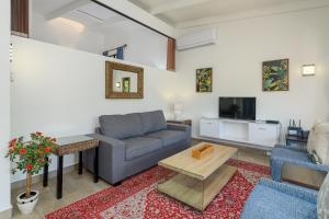 Et tv og/eller underholdning på San Lameer Villa 1909 - 1 Bedroom Classic - 2 pax - San Lameer Rental Agency