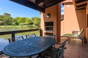 En balkon eller terrasse på San Lameer Villa 1909 - 1 Bedroom Classic - 2 pax - San Lameer Rental Agency + 50 billeder