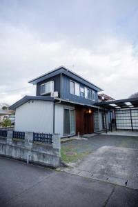 a house with a black and white at Shibatagun - House - Vacation STAY 17462 in Murata