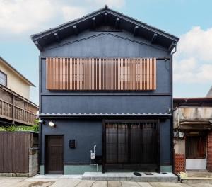 a blue house with a black facade at KYORAN-FUKITEI - Vacation STAY 57002v in Kyoto +11 photos