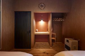a small room with a door leading to a bedroom at Okuaga Totonoi-no-Yado VILLA IGASHIMA - Vacation STAY 87919v in Aga