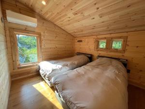 Postel nebo postele na pokoji v ubytování Polar House Minami Karuizawa2 Lake Garden - Vacation STAY 88935v