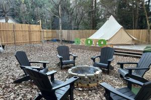 a group of chairs and a fire pit in a yard at Osoto Sauna & Glamping - Vacation STAY 91575v in Hokota +3 photos
