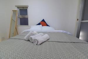 Katil atau katil-katil dalam bilik di Quayside Sakuragicho 201 - Vacation STAY 17682