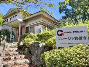 a house with a sign in front of it at Gracia Shuzenji - Vacation STAY 28497v in Izu
