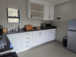 Η κουζίνα ή μικρή κουζίνα στο Potjiesberg Farm Stay