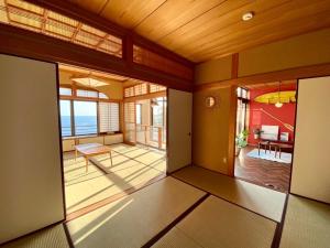an empty room with a view of a living room at Izu Base 73 - Vacation STAY 18722v in Okawa