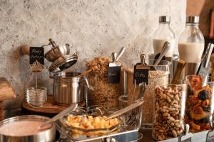 a table with a bunch of different types of food at B5 Boutique & Design Hotel - Adults Only in Lugano +81 photos