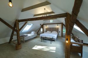 Postel nebo postele na pokoji v ubytování Siedlisko Dzika Kaczka