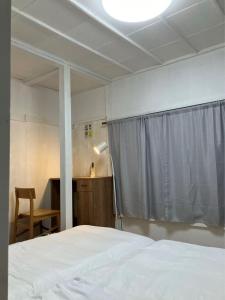 Katil atau katil-katil dalam bilik di Momijigaoka Atami Villa - Vacation STAY 17973