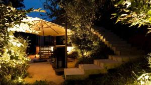 a building with an umbrella next to some stairs at THEATER 1 - Vacation STAY 40857v in Motojuku
