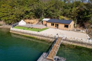 an aerial view of a house on the water at UMILABO - Vacation STAY 64339v in Shima
