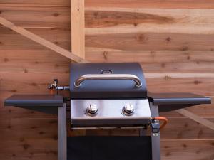 a stove in a room with a wooden wall at dejavu - Vacation STAY 28093v in Manazuru