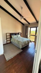 Ένα ή περισσότερα κρεβάτια σε δωμάτιο στο Slique Equine Estate