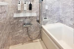 a bathroom with a shower with a toilet and a sink at 8Room - Vacation STAY 70847v in Yachimata +22 photos