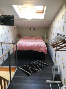 Ένα ή περισσότερα κρεβάτια σε δωμάτιο στο Maison très bien situé 4 pers