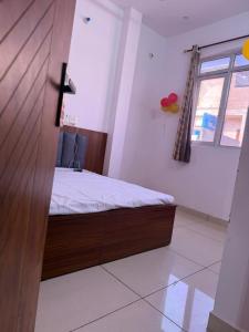 Postel nebo postele na pokoji v ubytování Moon light hotel