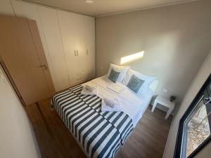 an overhead view of a small bedroom with a bed at The Nest in Drage +15 photos