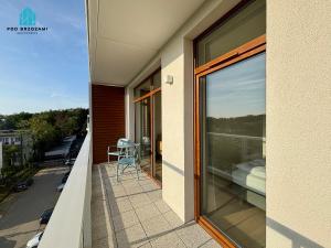 En balkon eller terrasse på Pod Brzozami Apartamenty Ku Morzu