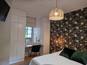 Postel nebo postele na pokoji v ubytování Tahko Apartment Kehtola, Tahkovuori