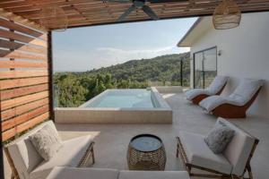 Fotografie z fotogalerie ubytování New Luxury 4BR Villa with Seaview v destinaci Haad Chao Phao