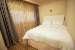 Ένα ή περισσότερα κρεβάτια σε δωμάτιο στο nile view modern studio- 7 min from aswan station