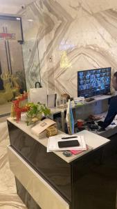 TV a/nebo společenská místnost v ubytování banorama hotel apartments